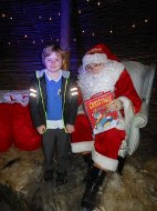 P1, Reception & P2 children visit Santa