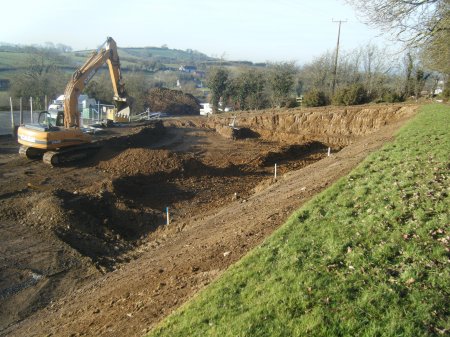 Soil being removed from the football field